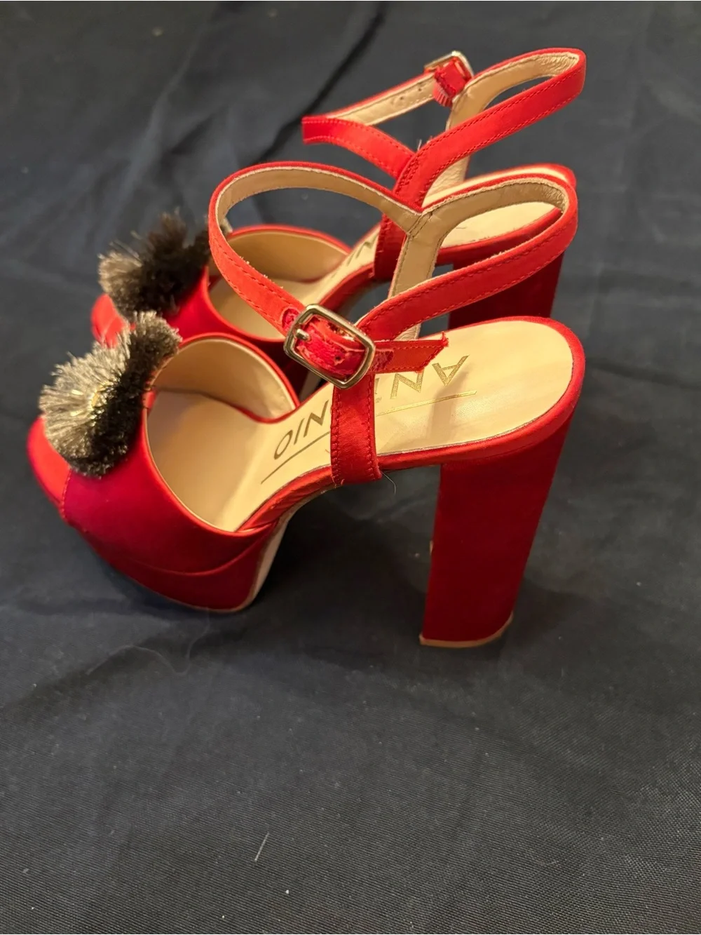ANTONIO MELANI bold red